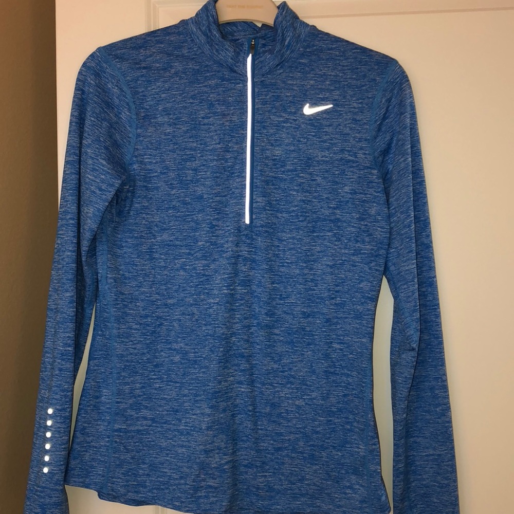 Nike Dri FIT small running top.